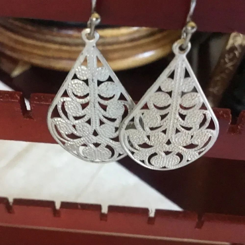 $8 ea or 3/$15. Teardrop Silvertone Earrings